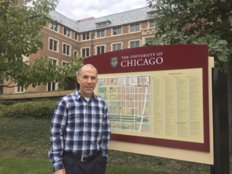 Dr. Mark Hofer on a university campus